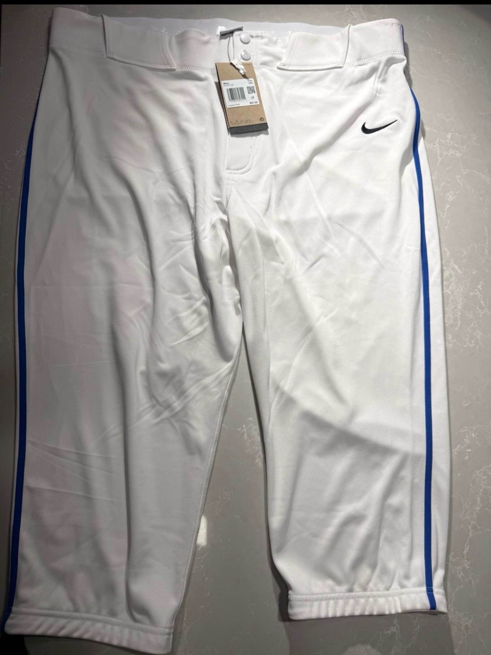 Nike Men’s White Athletic baseball pants with Blue Side Stripe